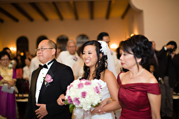 Mother and Father Walk Bride Down the Aisle
