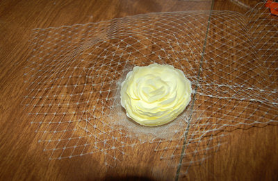 hot glue the flower in place