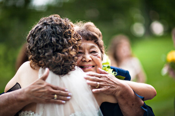 bride hugging wedding guest