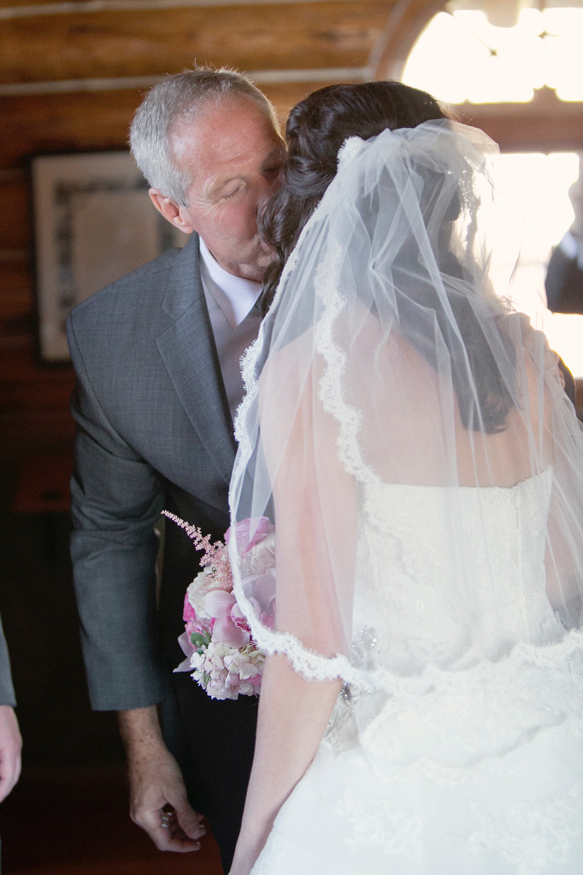 bride kissing dad