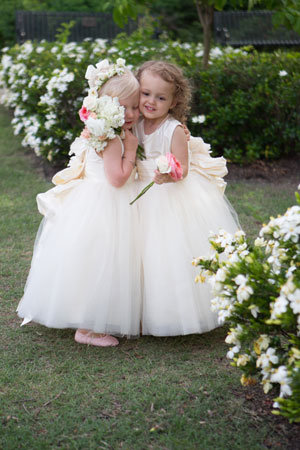 flower girls hugging