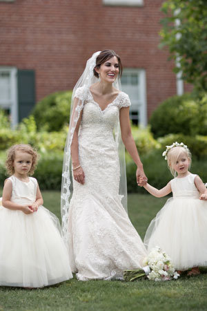 bride with flower girls