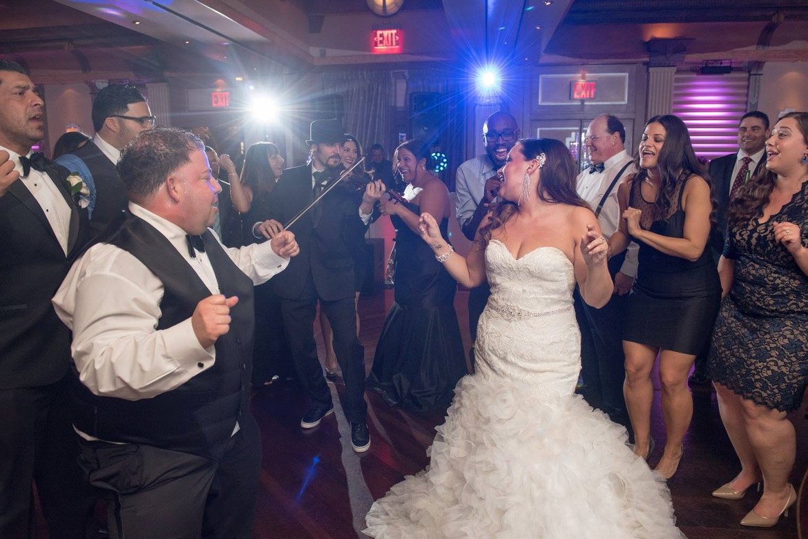 bride and groom dancing at wedding