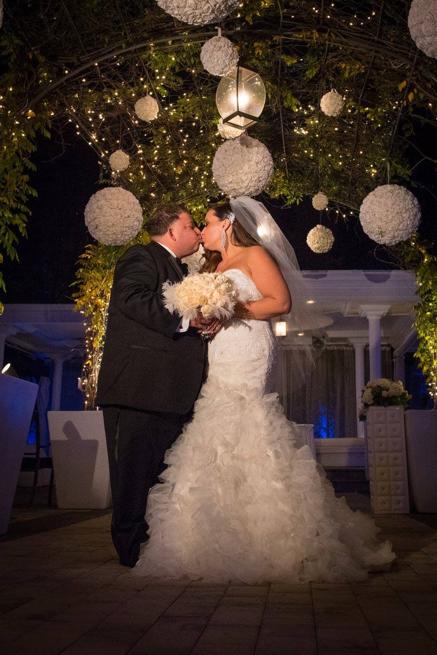 bride and groom kiss