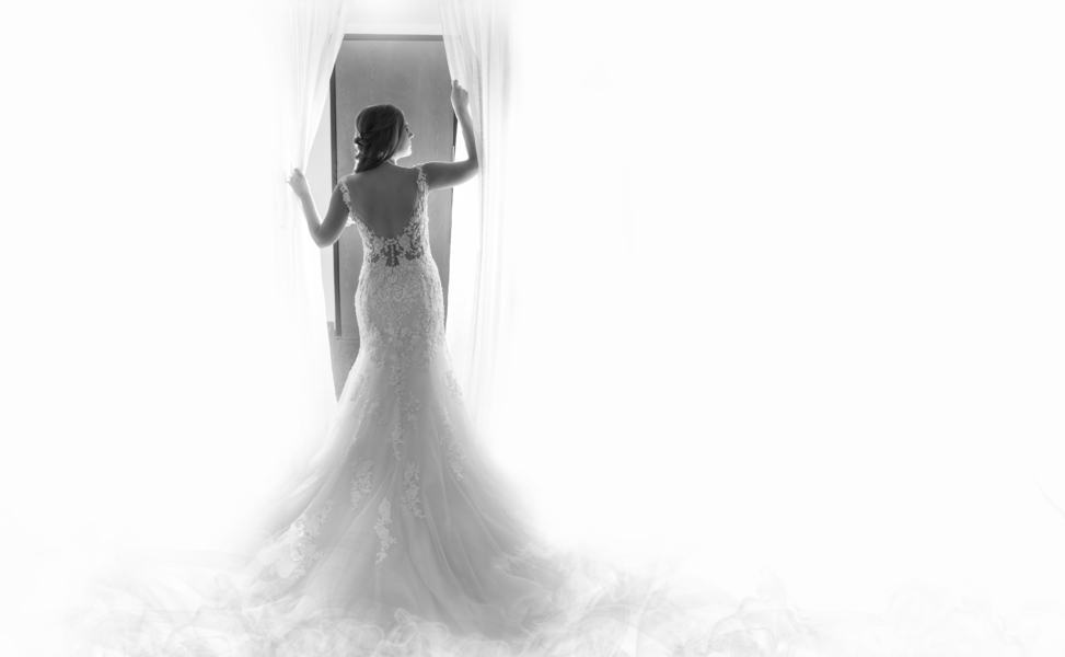 bride looking in mirror