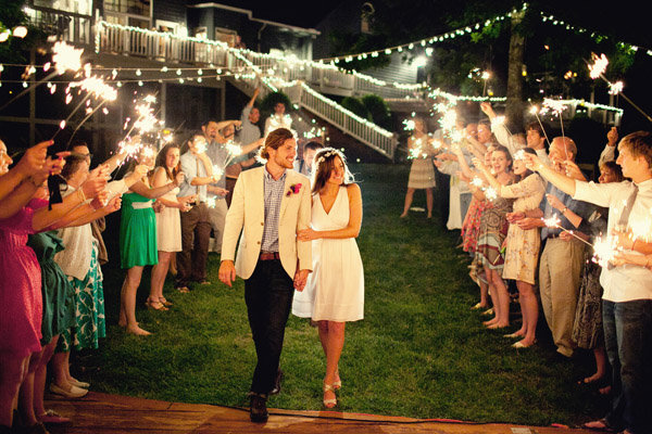 couple leaving wedding reception