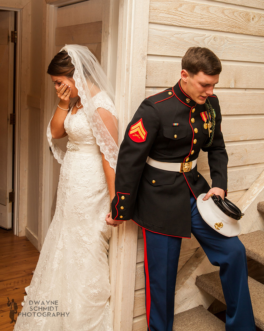 marine praying with wife