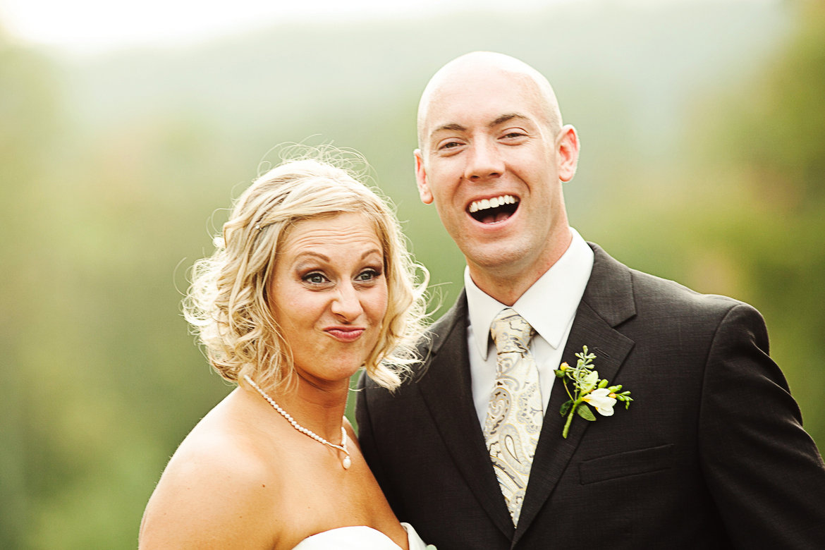 bride and groom making funny faces