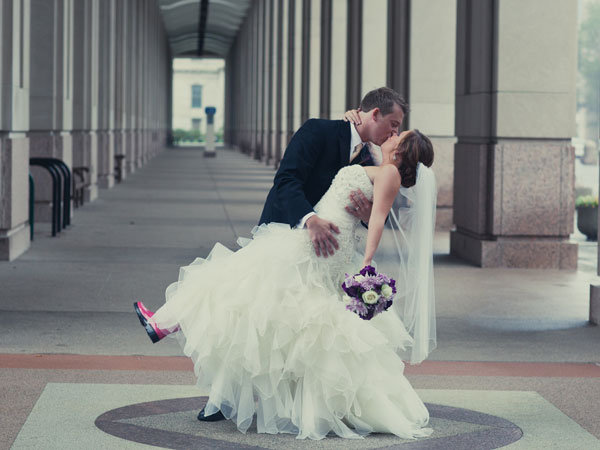 bride wearing rainboots