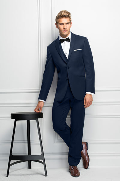 navy suit with cowboy boots