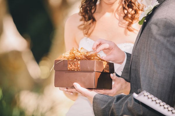 bride and groom with gift 