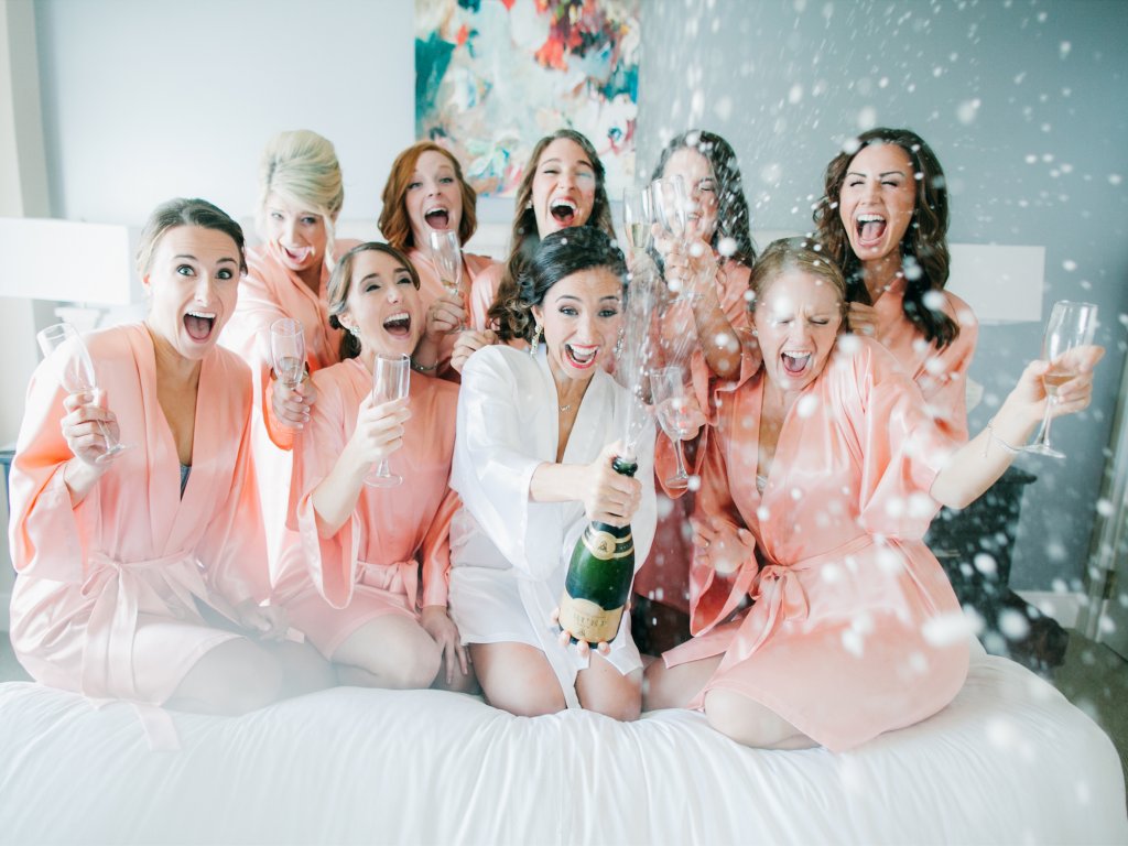 bridesmaids getting ready champagne