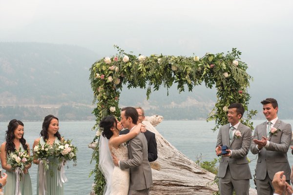 bride and groom kiss