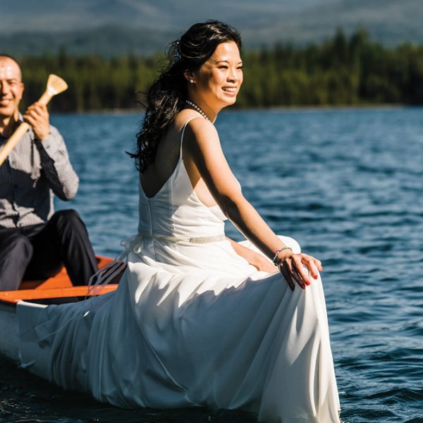 bride and groom on the water