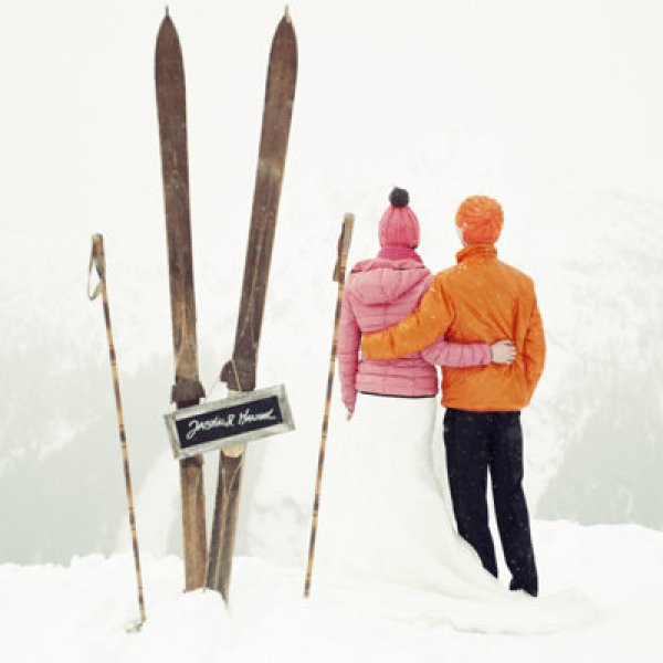 bride and groom skiing