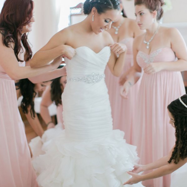 trying on wedding dress