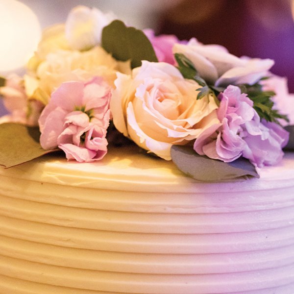 Wedding cake with flowers on top