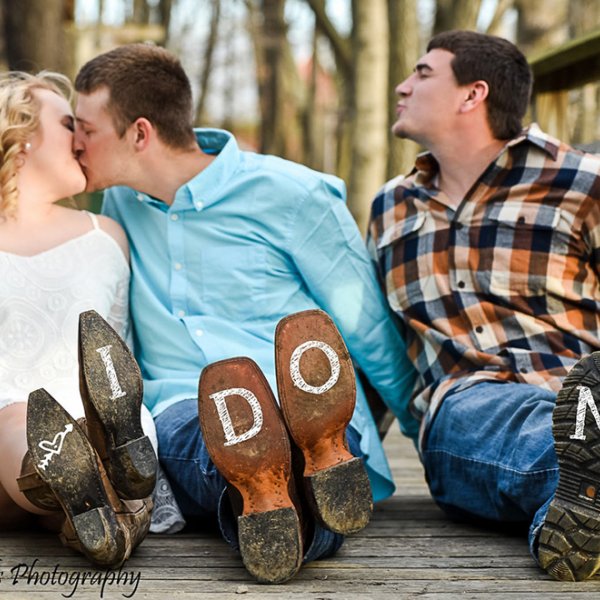 bride and groom engagement photo with best man