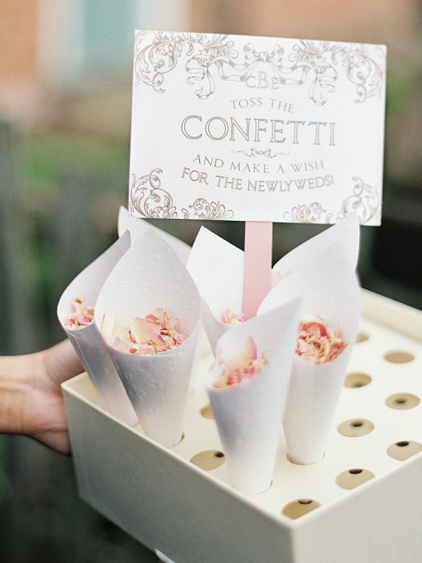 Festive cups of colorful confetti at wedding ceremony