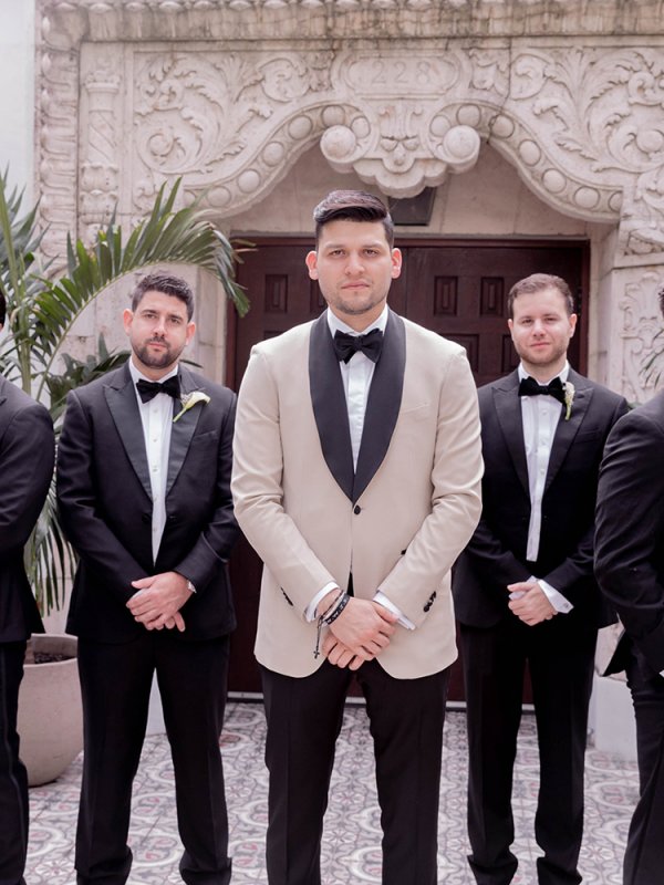 Groom in beige tux Groom in beige tux