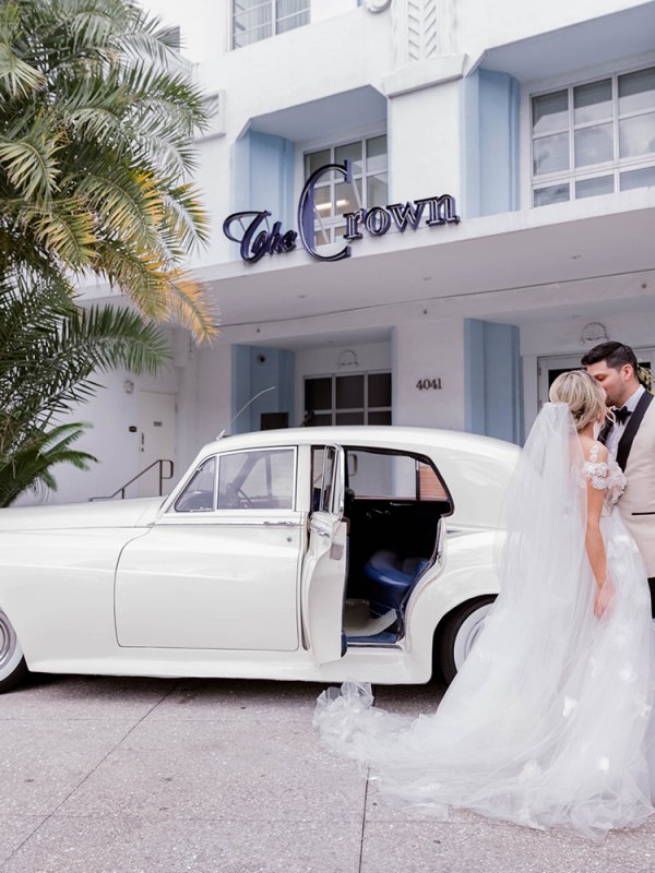 Vintage car transportation for bride and groom