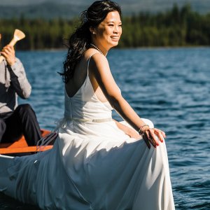 bride and groom on the water