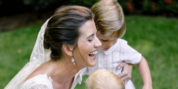bride with kids at wedding